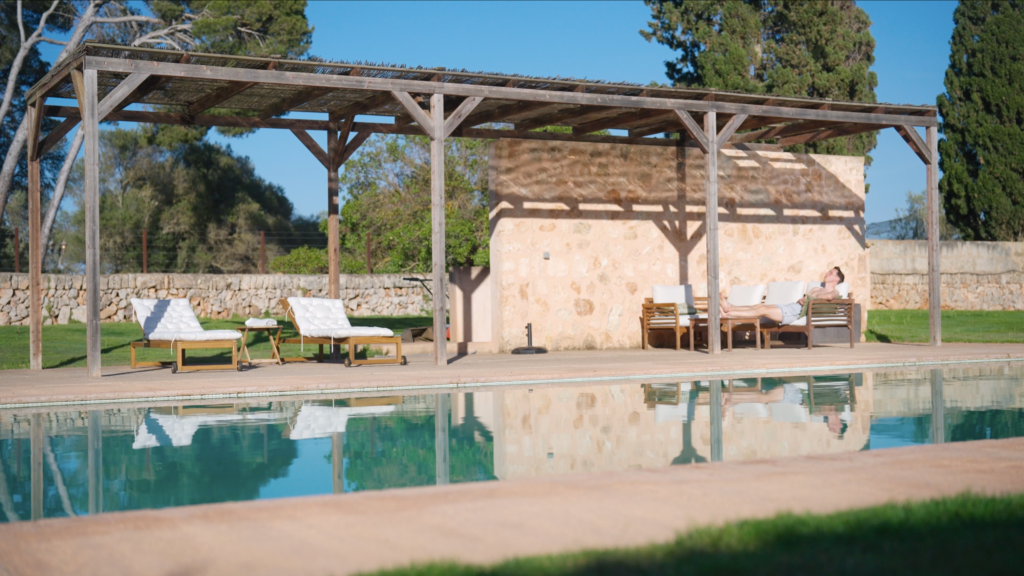 Poolside pergola shown by COGNIFUL for its Mallorca residential program